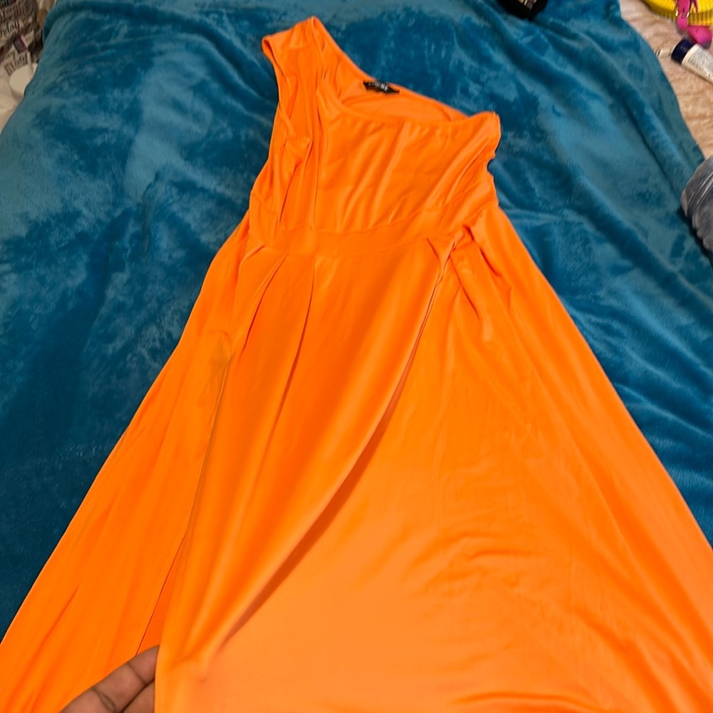 Orange one-shoulder dress, bold slit. Stand out in chic style!